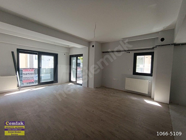 ALSANCAKTA SIFIR İNŞAAT 1.KAT 2 BANYOLU OTOPARKLI SATILIK DAİRE