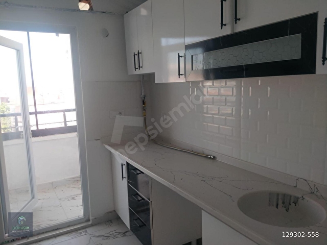 DÖNÜŞÜM EMLAKTAN HARMANLARDA 2+1 DAİRE FIRSATI
