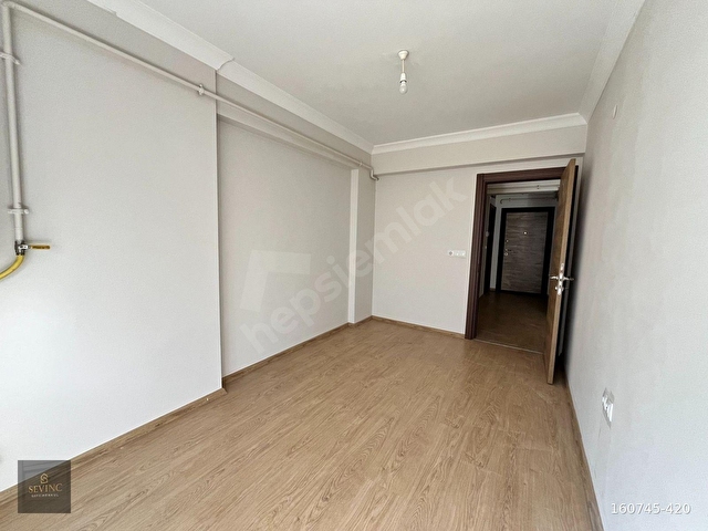 SEVİNÇTEN ATATÜRK CADDESİNDE ARAKAT KLİMA-ASANSÖRLÜ 1+1 KİRALIK - Görsel 4