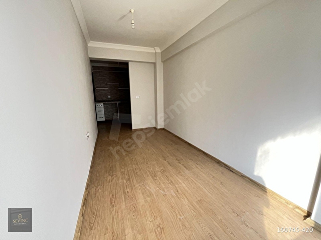 SEVİNÇTEN ATATÜRK CADDESİNDE ARAKAT KLİMA-ASANSÖRLÜ 1+1 KİRALIK - Görsel 3