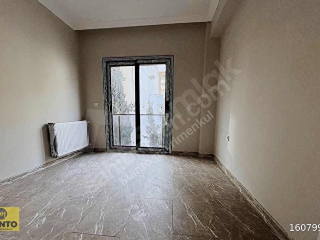 UĞUR MUMCUDA MERKEZİ KONUMDA GENİŞ VE FERAH SATILIK DAİRE - Görsel 4