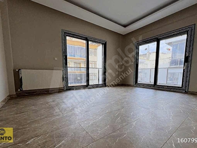 UĞUR MUMCUDA MERKEZİ KONUMDA GENİŞ VE FERAH SATILIK DAİRE - Görsel 9