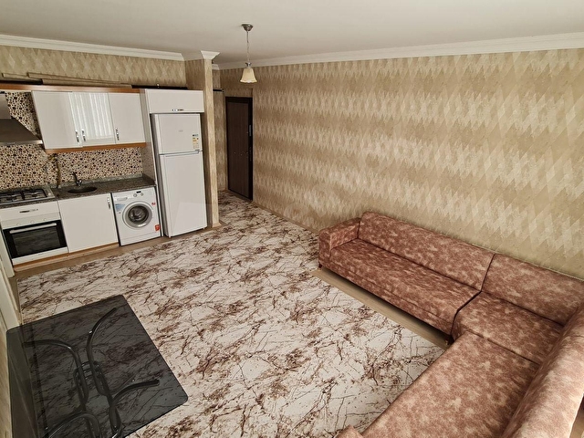 AKTİFTEN ALAÇATI SİTESİNDE EŞYALI BAKIMLI MASRAFSIZ DAİRE
