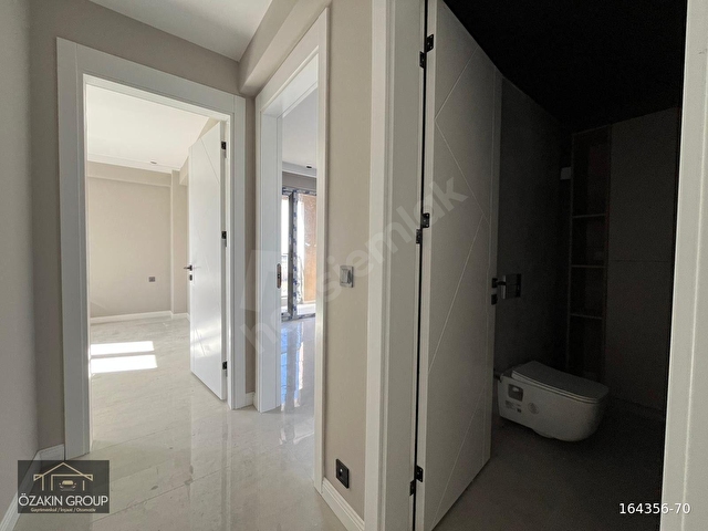 ÖZAKIN GAYRİMENKUL’DEN YENIŞEHİR MAHALLESİNDE SATILIK 3+1 SIFIR ARAKAT FIRSAT DAİRE - Görsel 20