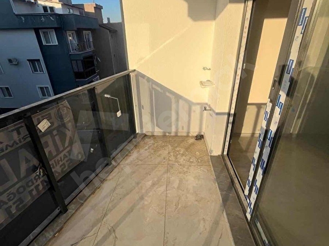 Davutlar Merkezde Ön Cephe Asansörlü Kiralık 1+1 - Görsel 2