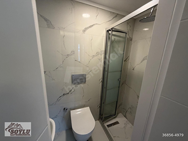 SOYLU GAYRİMENKULDEN SOKULLU CADDE ÜZERİNDE 3+1 1.KAT EBEVEYN BANYOLU FULL YAPILI SATILIK DAİRE - Görsel 28