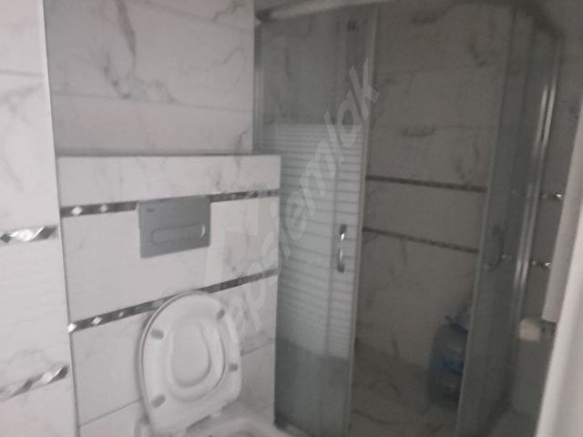 ÇİFTLİKKÖYDE SAHİLE 1 SOKAK MESAFEDE BOŞ 3+1 SATILIK DAİRE - Görsel 18