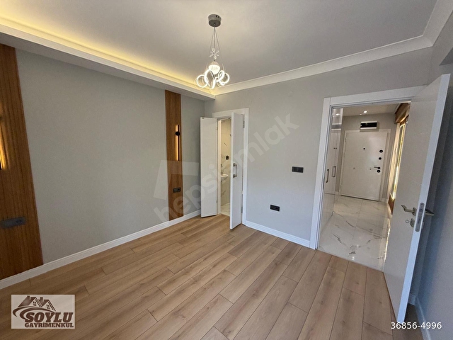 SOYLU GAYRİMENKULDEN SOKULLU CADDE ÜZERİNDE 3+1 1.KAT EBEVEYN BANYOLU FULL YAPILI SATILIK DAİRE - Görsel 14