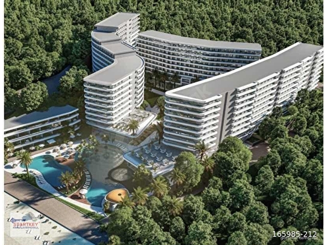 Kuşadası Denize Sıfır Projede Deniz Manzaralı Satılık 1+1 Daire