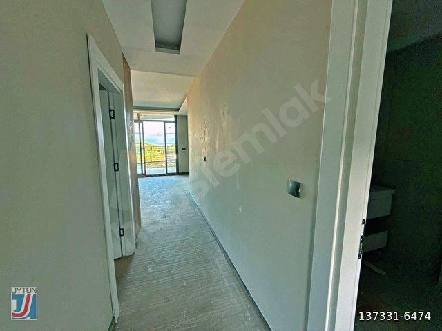 UYTUNDAN GÜREDE LÜKS SİTE PANORAMİK DENİZ MANZARALI BAHÇELİ 1+1 - Görsel 29