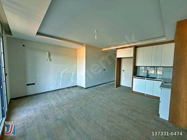 UYTUNDAN GÜREDE LÜKS SİTE PANORAMİK DENİZ MANZARALI BAHÇELİ 1+1 - Görsel 25