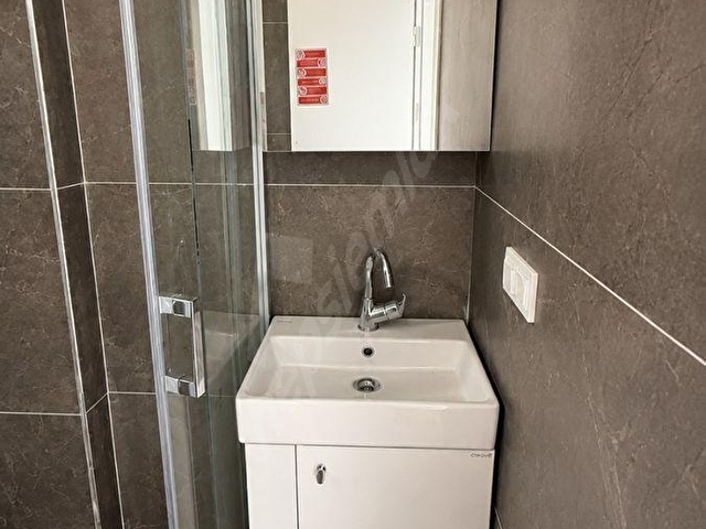 YENİMAHALLE ÇARŞI CADDESİNDE SIFIR BİNADA KİRALIK 1+1 DAİRE - Görsel 20