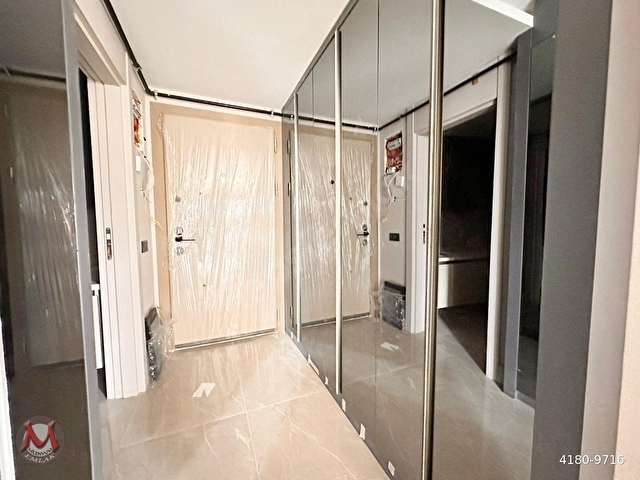 MENEKŞE KARNA 1 PROJESİNDE 1+1 55M² 1.KAT ARAKAT SIFIR LÜKS YERDEN ISITMALI K.OTOPARKLI ÇİFT ASANSR - Görsel 19