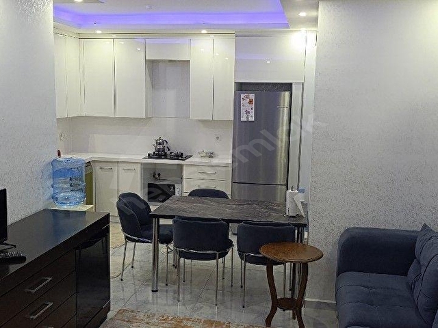 Kuşadası Değirmendere de Havuzlu sitede sezonluk kiralık eşyalı 1+1 daire - Görsel 5