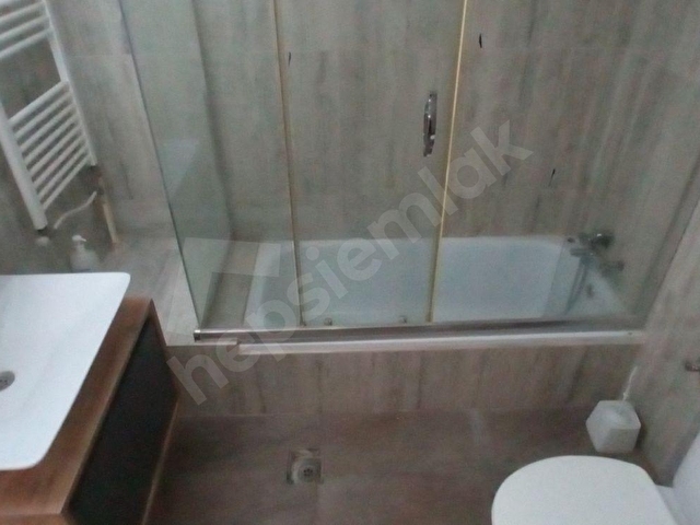 Güzelyalı merkezde cadde üstü köşe şömineli klasik temiz 4 + 1 - Görsel 17
