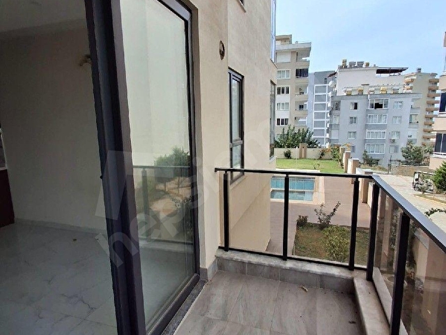 ALANYA MAHMUTLAR MAHALLESİNDE SATILIK YATIRIMLIK 1+1 DAİRE - Görsel 13