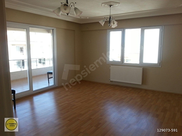 TURPA SÖNMEZDEN MERKEZİ LOKASYONDA GENİŞ FERAH DAİRE