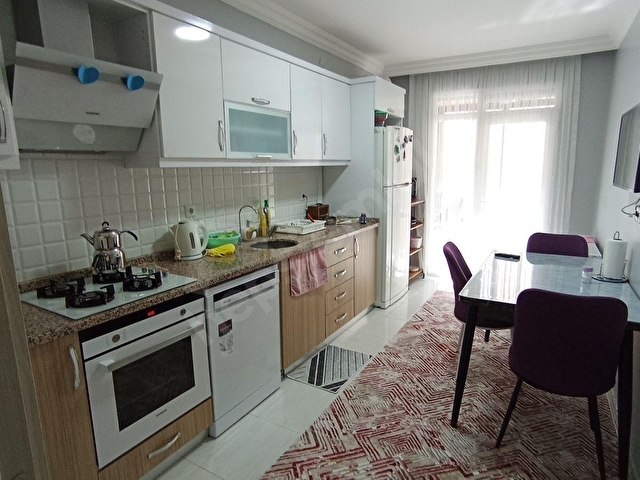 REAXAdan Satılık Daire - Zafer Mh-Dipçin Sk. - Tam bakımlı-Çok temiz - Kat:2/4  2+1  100 m2.