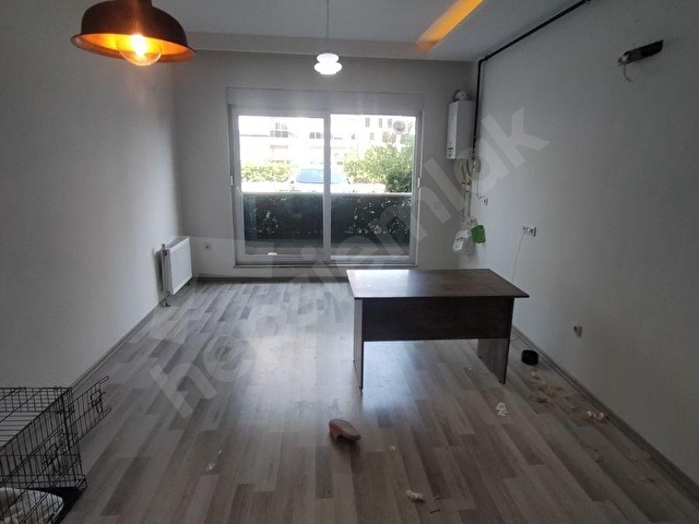 GÜLVEREN KONUTLARINDA 1+1 65 M2 DOĞALGAZLI GİRİŞ KAT DAİRE