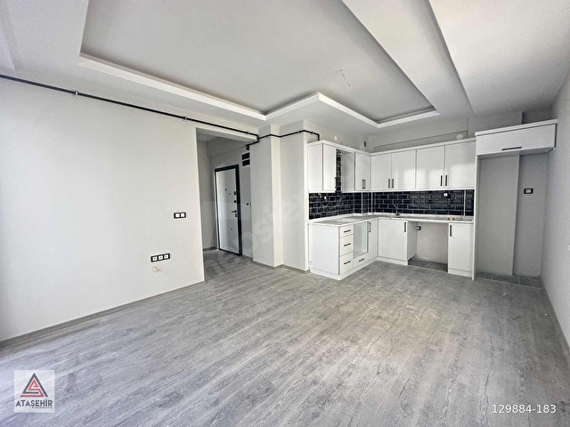 ATAŞEHİRDEN TOPLU KONUT BULVARINA YAKIN EŞYASIZ 1+1 DAİRE