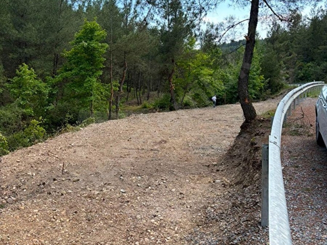 MUĞLA MENTEŞE ALGI MAHALLESİNDE ASFALT YOL KENARI SU KUYUSU OLAN SATILIK TARLA