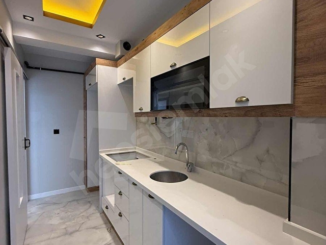 TEPEBAŞI ÇAMLICA MAH. BALKONLU ZEMİNDEN ISITMA 2+0 SATILIK DAİRE - Görsel 12