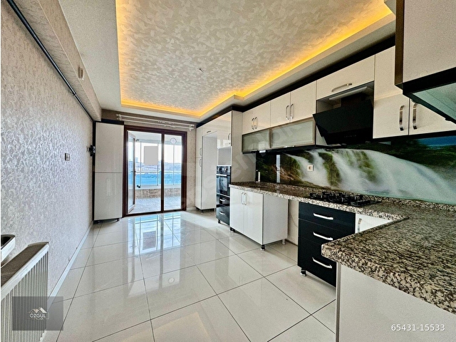 ÖZGÜL EMLAKtan FULL DONANIMLI LÜX SİTEDE ÇİFT BANYOLU KİLERLİ FULL YAPILI ARA KAT 4+1 DAİRE