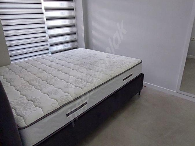 ATAMANDAN YENİ BİNADA ASANSÖRLÜ LÜKS EŞYALI 1+1 KİRALIK DAİRE - Görsel 13