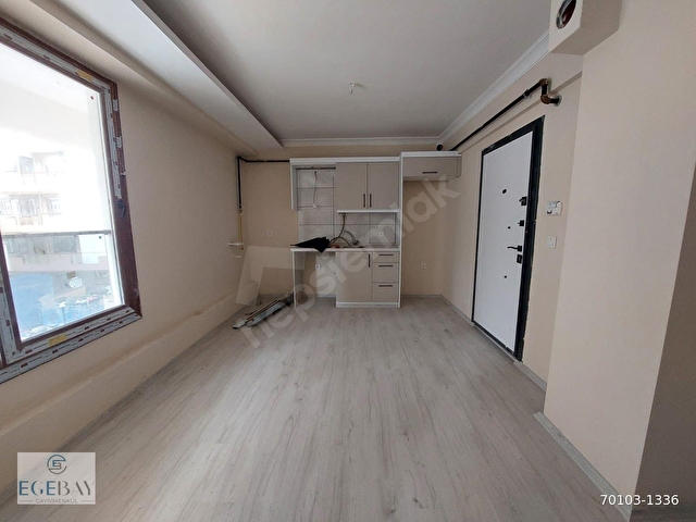 ŞİRİNYER LALELİ MH.DE TOPLU ULAŞIM ARAÇLARINA YAKIN KONUMDA 1+1 DAİRE