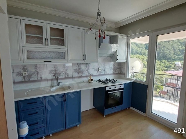 KUŞADASI GÜZELÇAMLIDA DENİZ VE ORMAN MANZARALI SATILIK 3+1 DAİRE