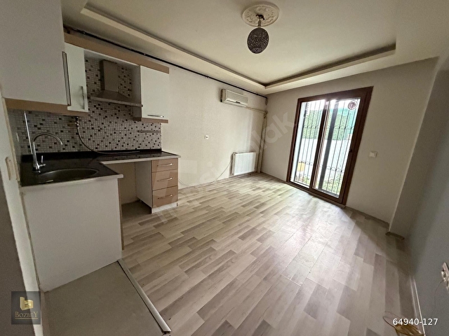 BUCA ATATÜRK MAH. 1+1 45 M2 GİRİŞ KATI BAHÇELİ DOĞALGAZLI KİRALIK DAİRE