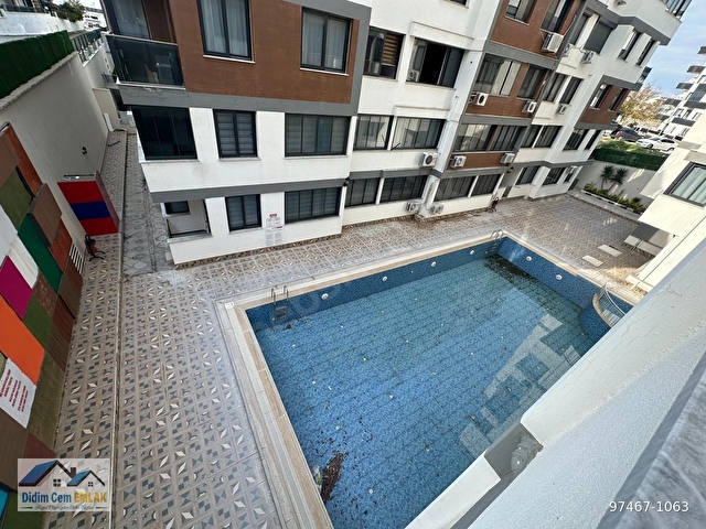 HAVUZLU SİTEDE YÜKSEK GİRİŞ ARA KAT SATILIK 2+1 DAİRE