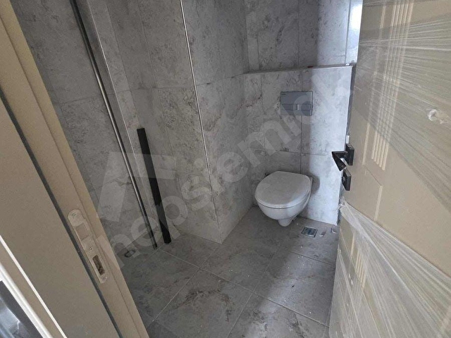PARLADAN DENİZE YÜRÜME MESAFESİNDE HAVUZLU 1+1 SATILIK DAİRE - Görsel 4