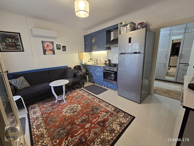 LİMAN LÜKS 1+1 EŞYALI HAVUZLU DENİZE YAKIN Продажa