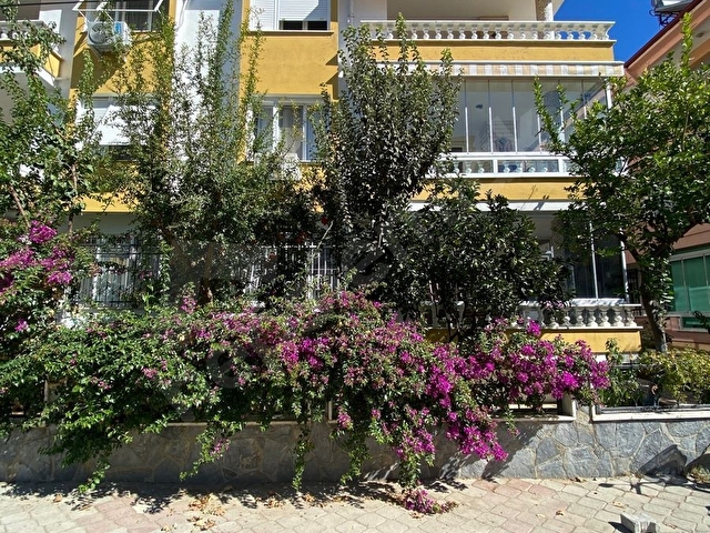 Işık emlak tan Altınoluk merkezde satılık giriş kat daire