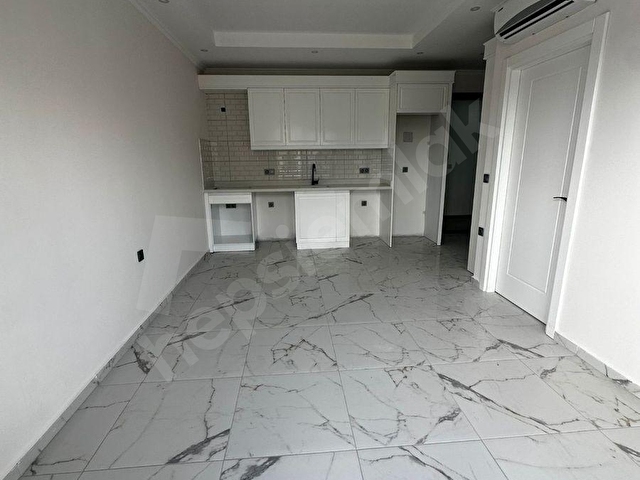 DEMİRTATA SATILIK 1+1 DENİZ VE HAVUZ MANZARALI DAİRE OTEL KONSEPTİNDE SİTE - Görsel 10