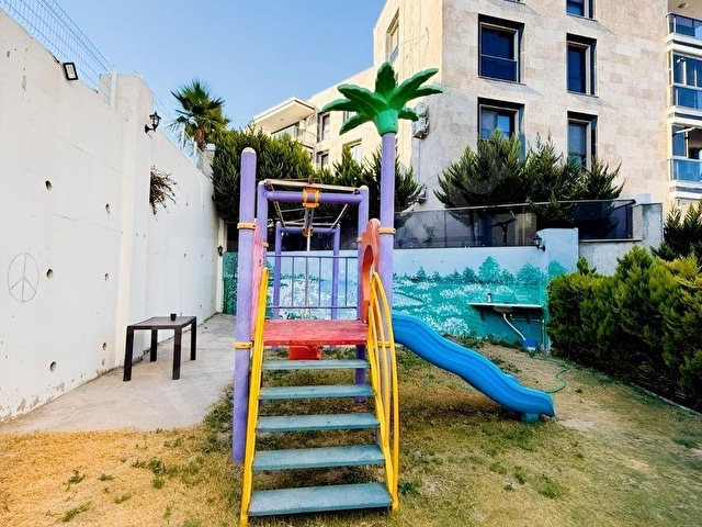 KUŞADASI QUEEN ADA SİTESİNDE EŞYALI SATILIK 1+1 DAİRE - Görsel 2