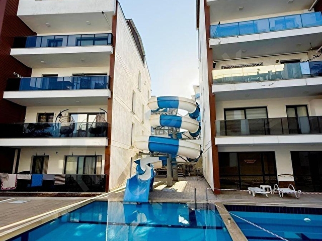 KUŞADASI QUEEN ADA SİTESİNDE EŞYALI SATILIK 1+1 DAİRE - Görsel 3