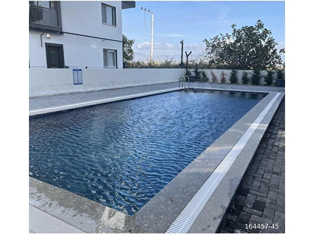 SEYREK TE DOĞALGAZLI HAVUZLU SİTEDE SATILIK ARA KAT 1+1 DAİRE - Görsel 2