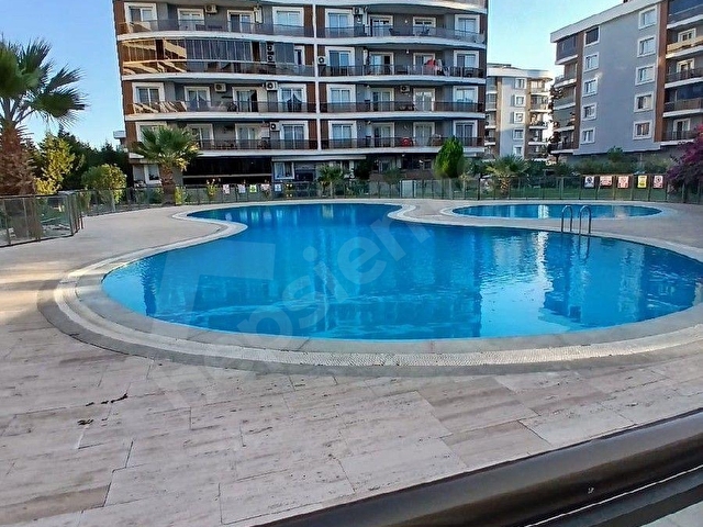 izmir Torbalı da 3+1 havuzlu sitede satılık daire