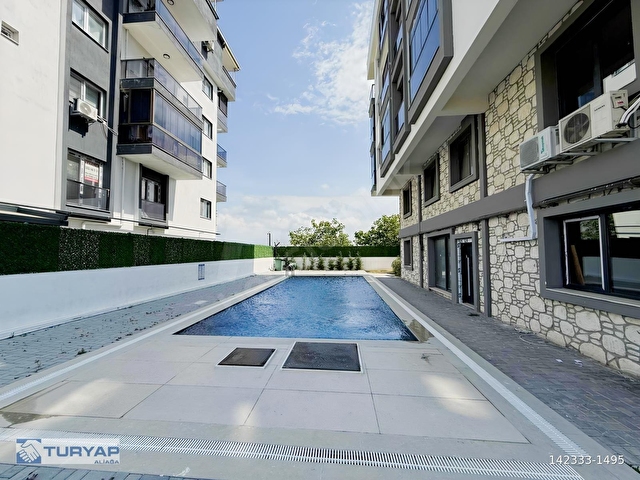 SEYREKTE HAVUZLU SİTEDE SATILIK 1+1 DAİRE - Görsel 12