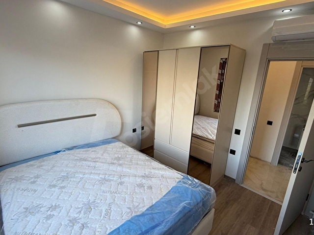 ERDEMLİ MERKEZ 1+1 HAVUZLU LÜKS DENİZ MANZARALI SATILIK DAİRE - Görsel 9