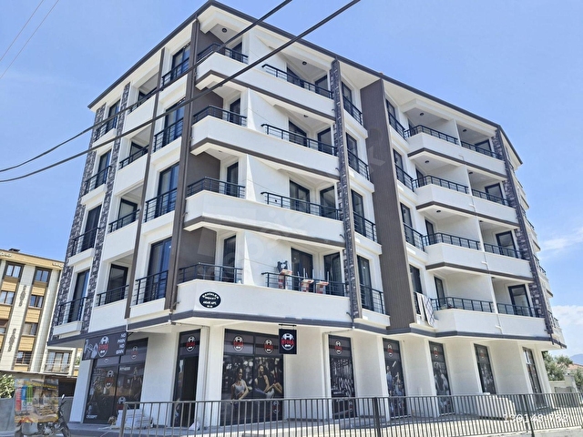 GÖMEÇ ÇARŞI MERKEZİNDE MUHTEŞEM KONUMDA 3+1 DAİRE