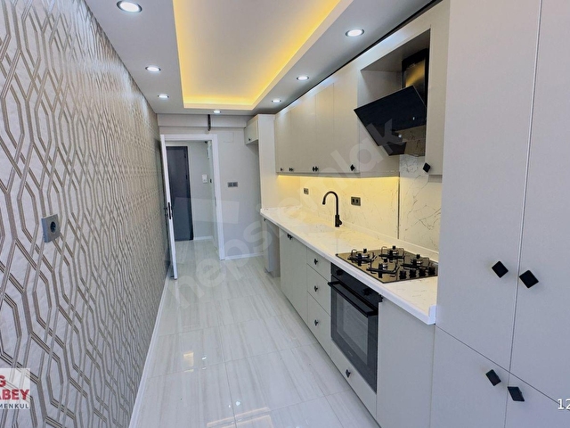 MAVİ BULVARDA BARAJ LİSESİ CİVARI KAP.MUTFAK 3+1 SATILIK DAİRE
