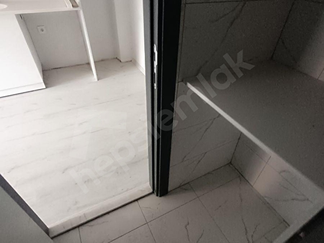 EGE ÜNİVERSİTESİ YAKINI SIFIR 1+1 ARA KAT SATILIK DAİRE - Görsel 8