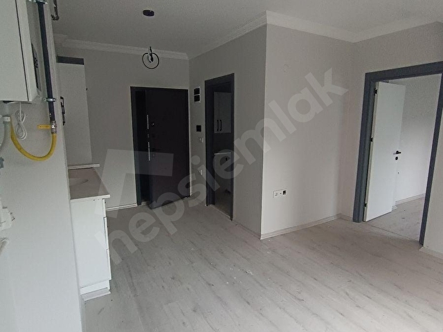 EGE ÜNİVERSİTESİ YAKINI SIFIR 1+1 ARA KAT SATILIK DAİRE - Görsel 3