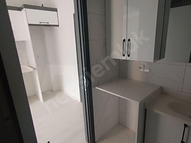 EGE ÜNİVERSİTESİ YAKINI SIFIR 1+1 ARA KAT SATILIK DAİRE - Görsel 7