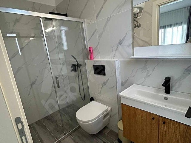 İSKELE CAESAR BLUE 2+1 BÜYÜK TİP EŞYALI TAKASLI SATILIK DAİRE - Görsel 15