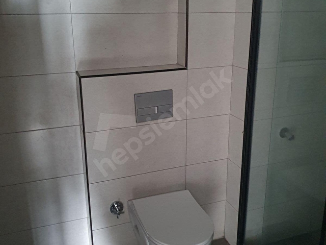 BAHÇELİEVLER MAHALLESİNDE CADDE ÜSTÜ SATILIK 1+1 LÜKS DAİRE - Görsel 14