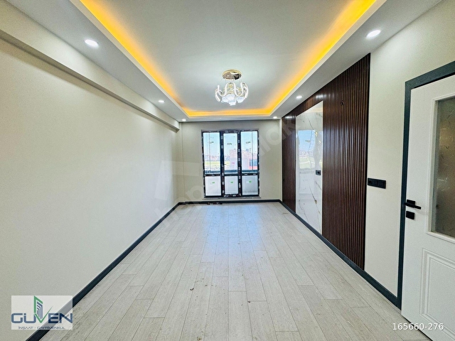 GÜVENDEN KAPAKLIDA KAPALI OTOPARKLI,YERDEN ISITMALI 2+1 DAİRE